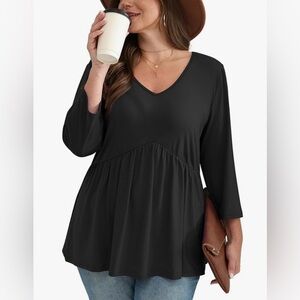 New Women’s babydoll black top. Flowy loose fit. Size Small. Runs big.